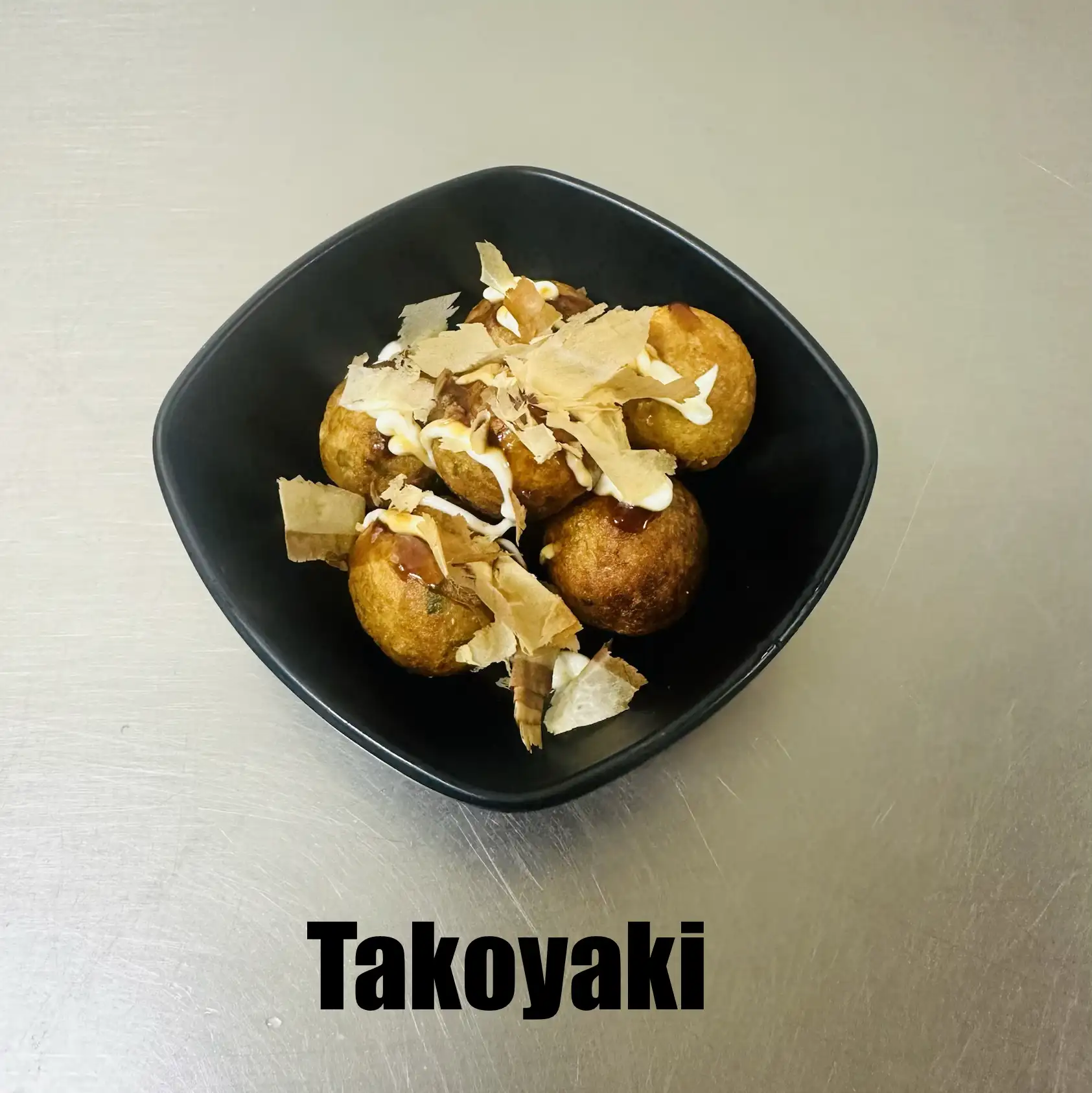 A8. Takoyaki.